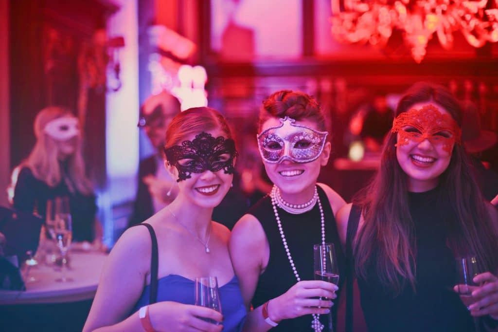 group of women wearing mask