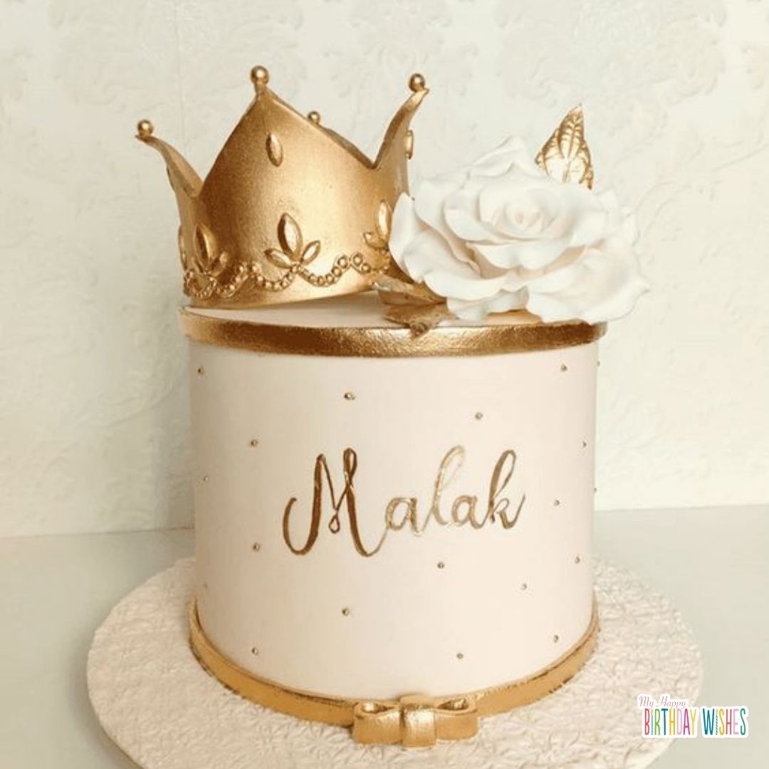 elegant birthday cake with crowns and flowes