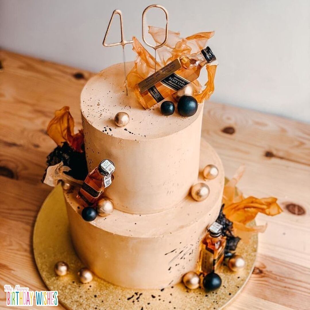 40th Birthday Cake for Men - a peach, gold, black theme cake with wine bottles.