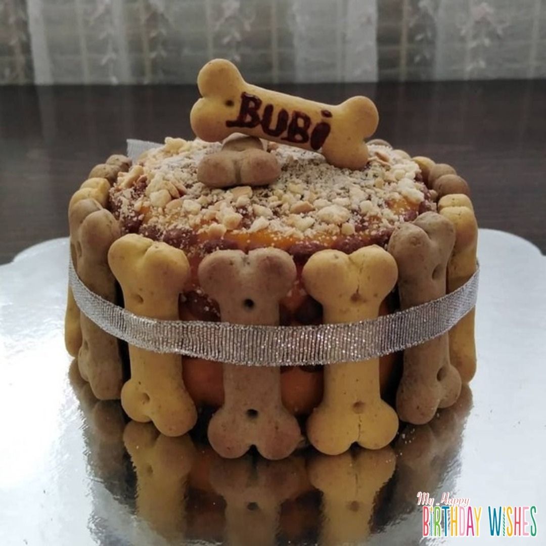 Biscuits Dog Birthday Cake - a dog cake wrapped with biscuits.