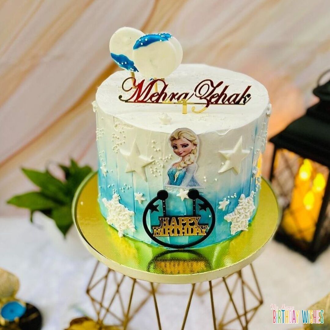 Disney Frozen Elsa Layer Cake with star and snow flake candies.