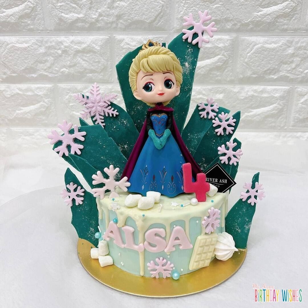 Frozen Princess Cake - a cute cartoon fondant of Elsa on top with green castle vibes.