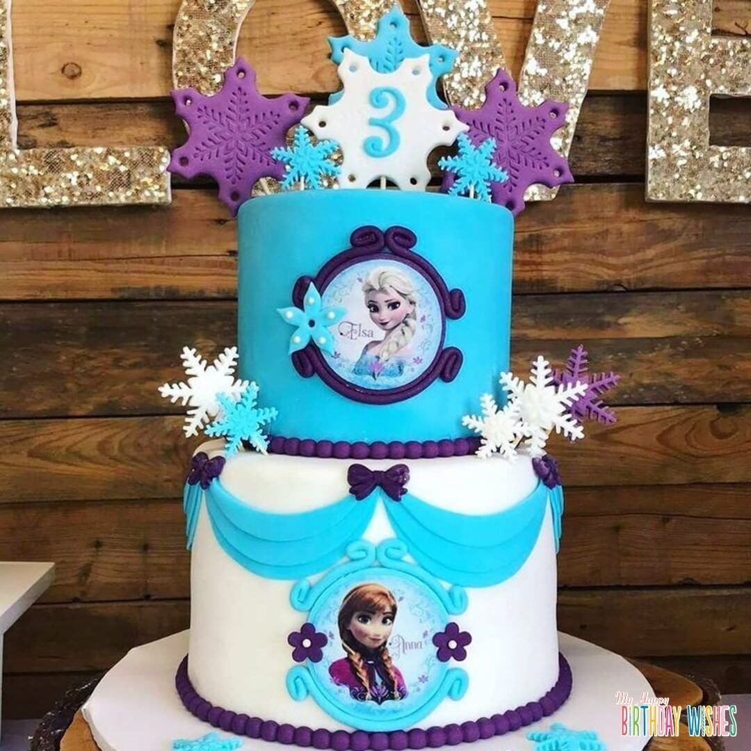 Frozen Tier Cake is having picture of Anna and Elsa in each tier.
