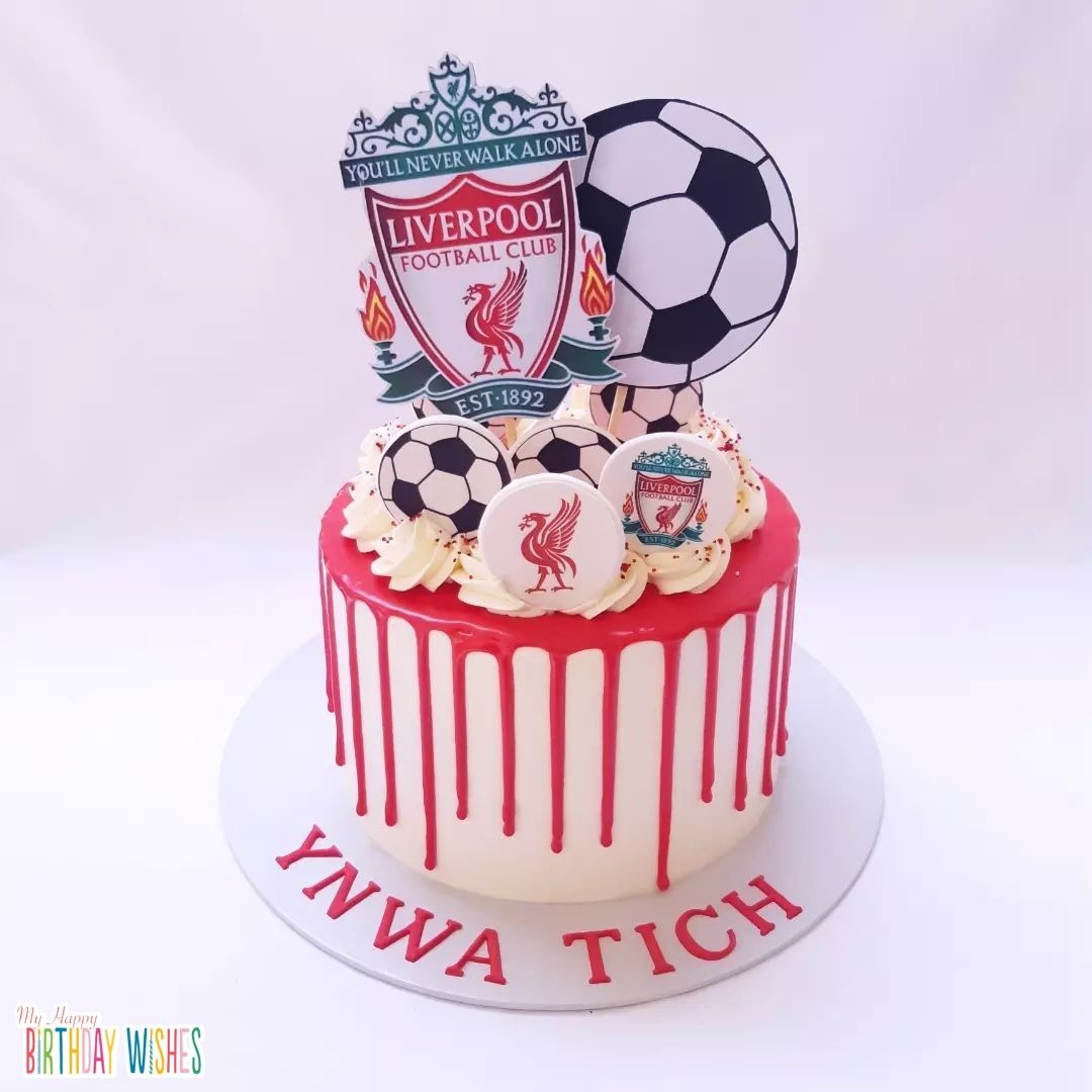 Liverpool Themed Birthday Cake with soccer balls topper with pink drop around.