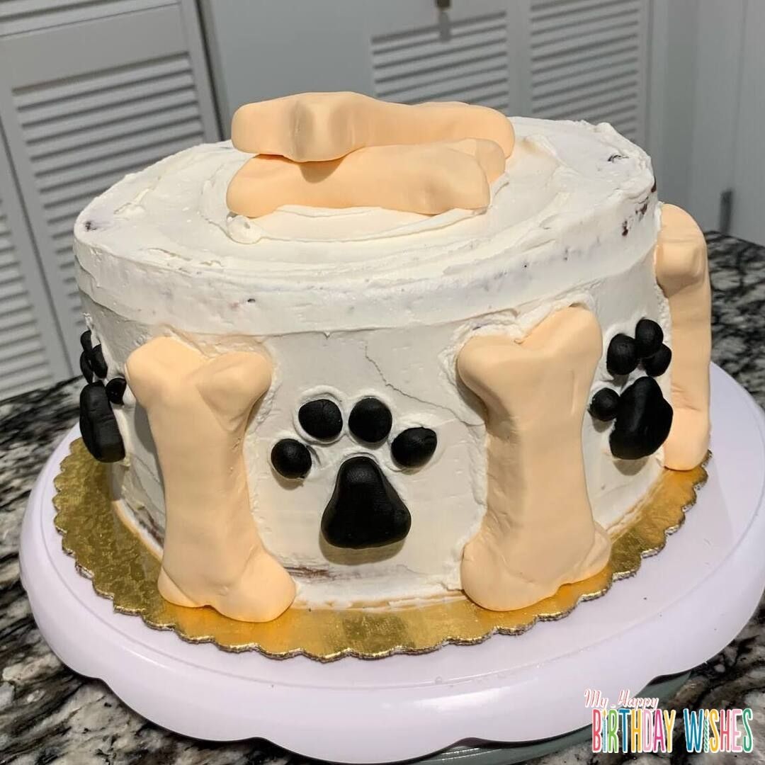 Minimalist Bone Cake - a dog cake with paw and bone design. 