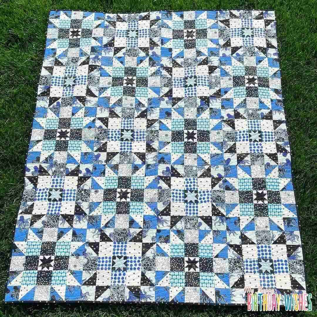 Octopuses Patchwork Quilt in different shades of blue.