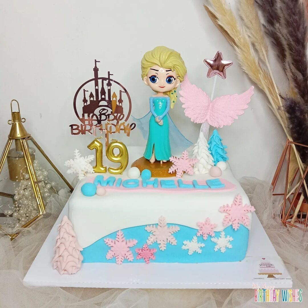 Square Elsa Fondant Cake in Forest with number candle and candy topper.