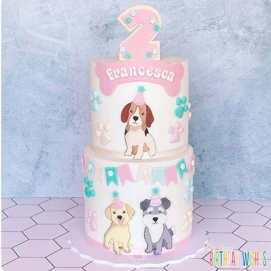 Two Tier Pastel Dog Cake - a Dog cake with different dog topper in each tier. 