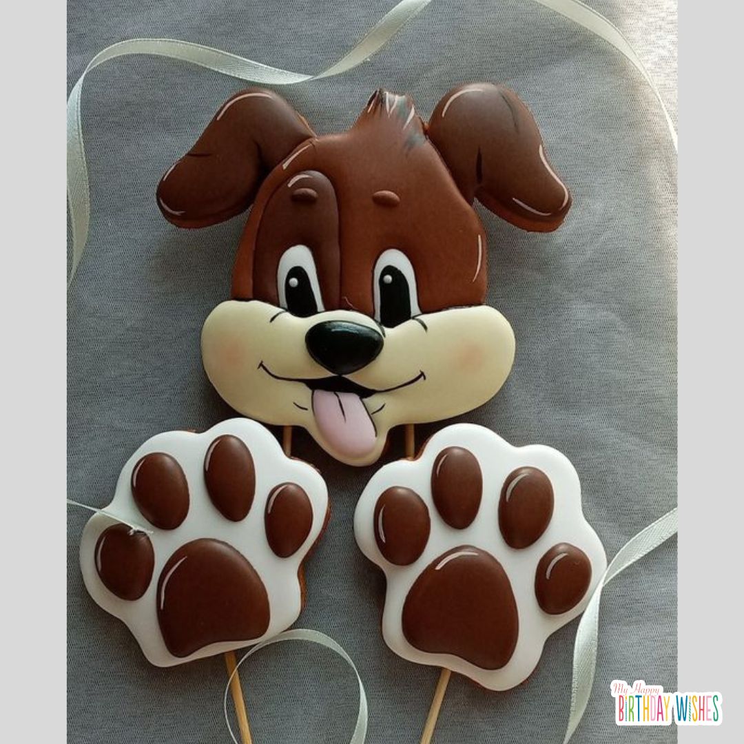brown dog cake with face and paw design