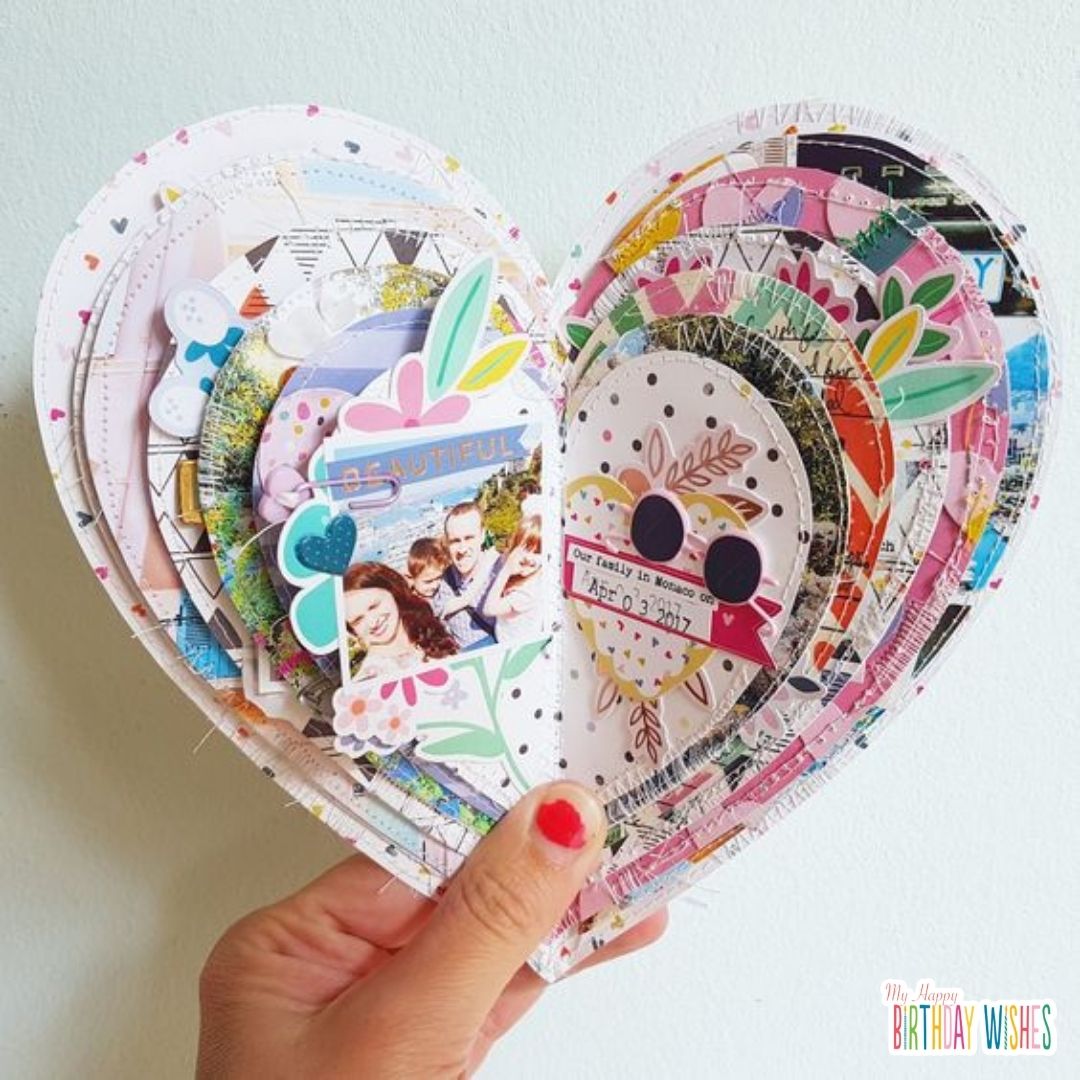 scrapbook design with a heart shaped full of letters and pictures