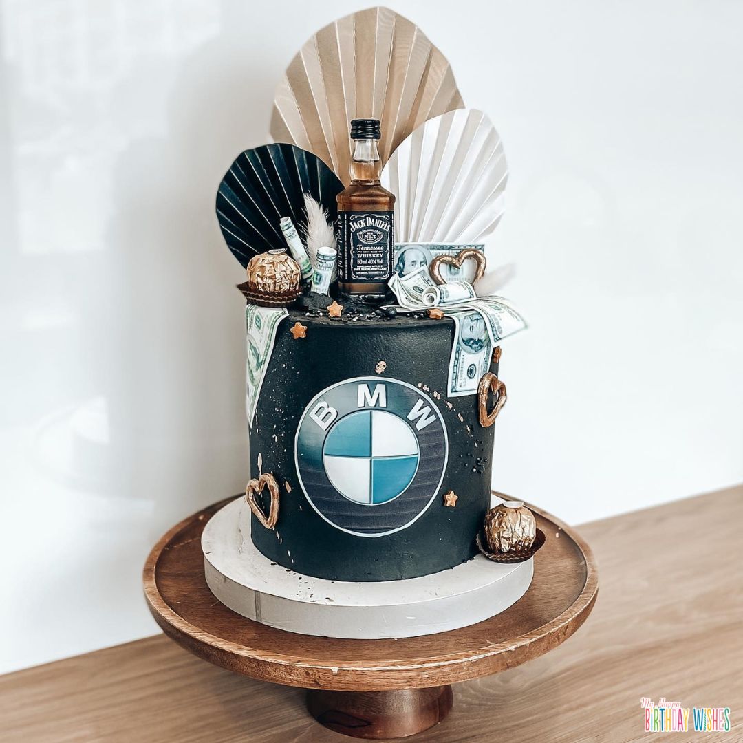 BMW Cake with toppers and bottle of wine