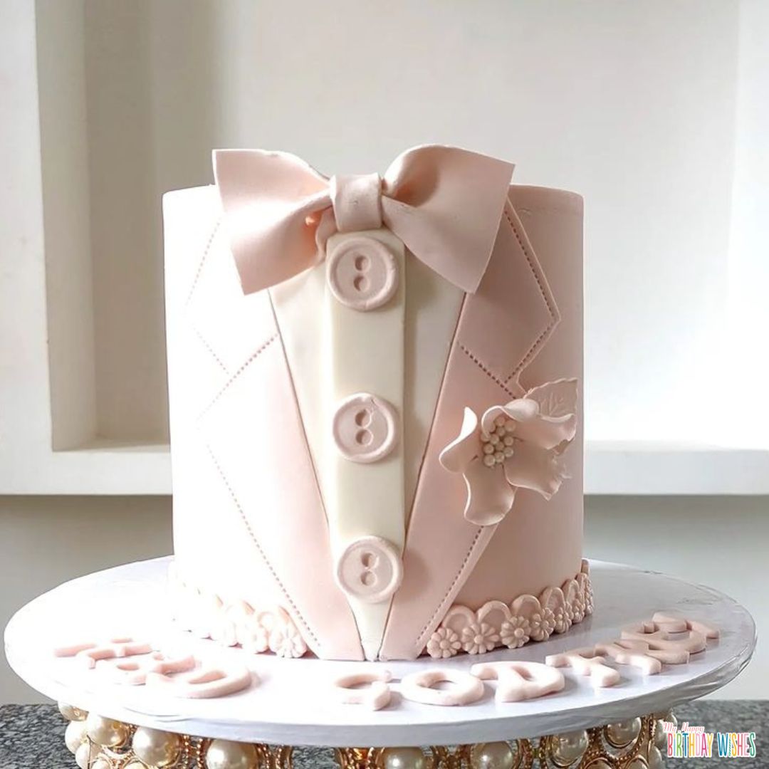 cute pink and white tuxedo fondant cake