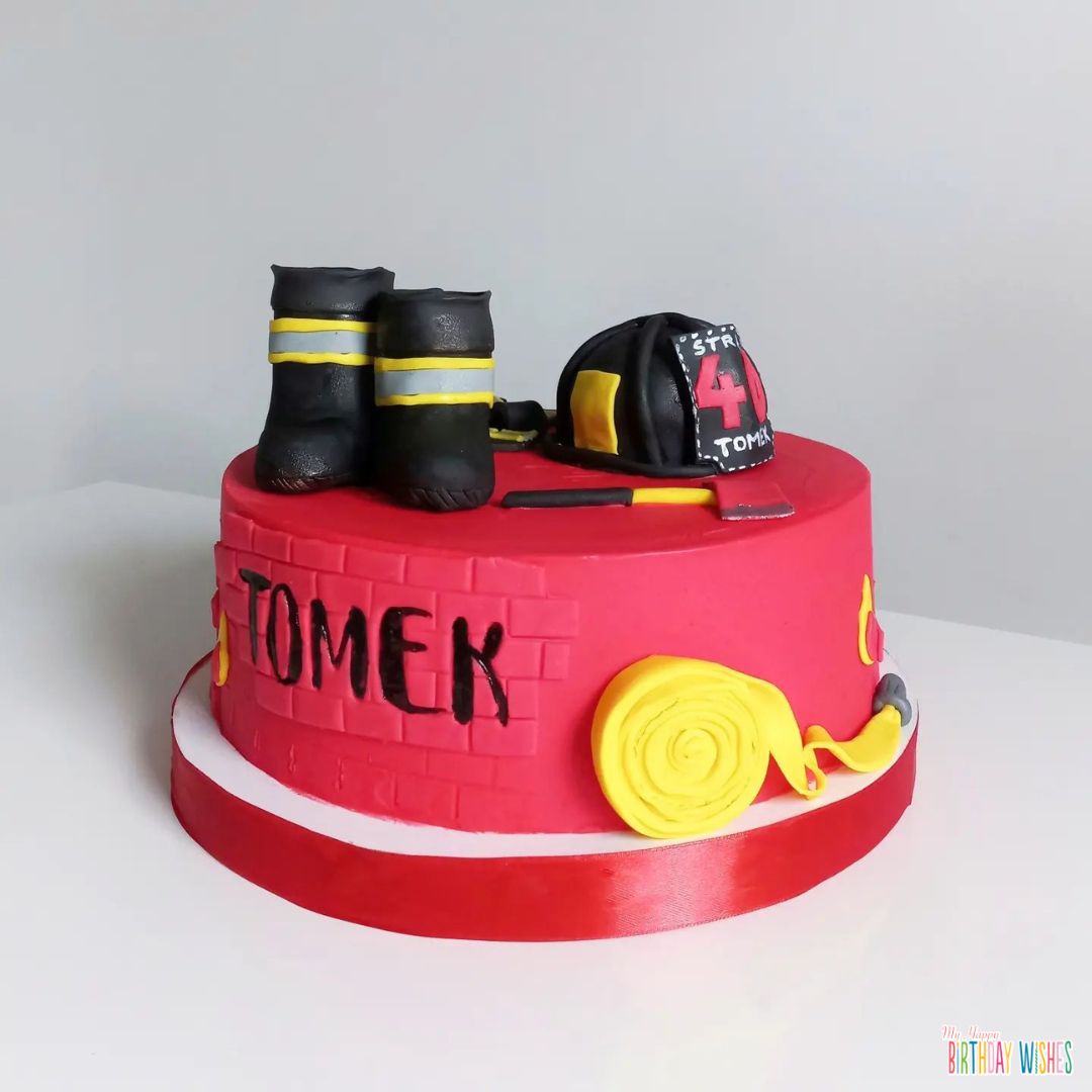 Fireman Inspired Cake with accessories on top