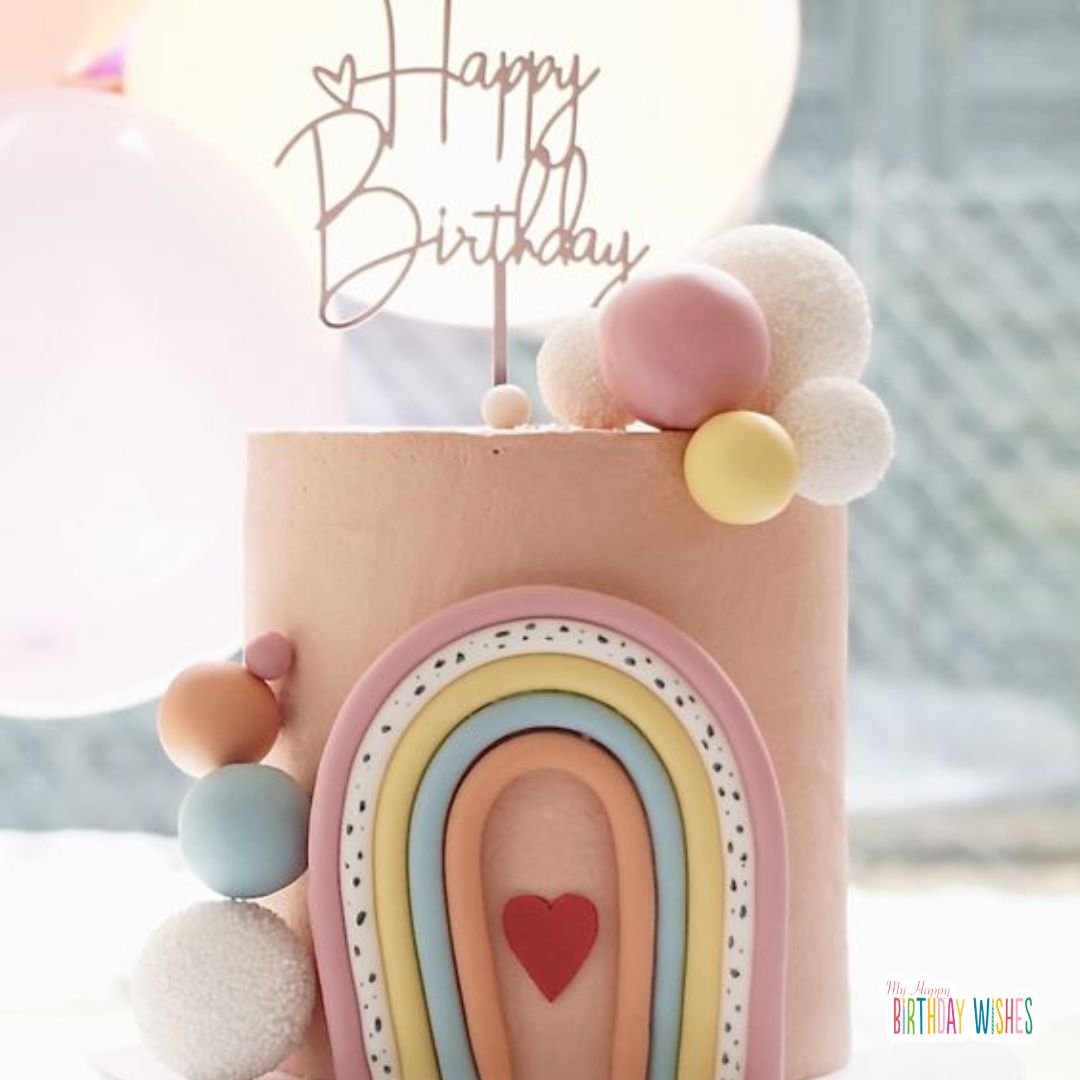 birthday cake with rainbow and foam balls