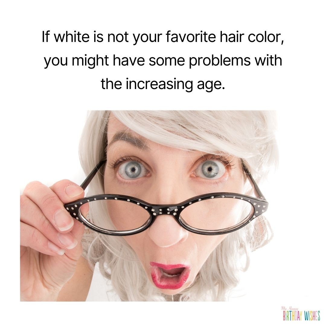 Woman wearing glasses in white hair